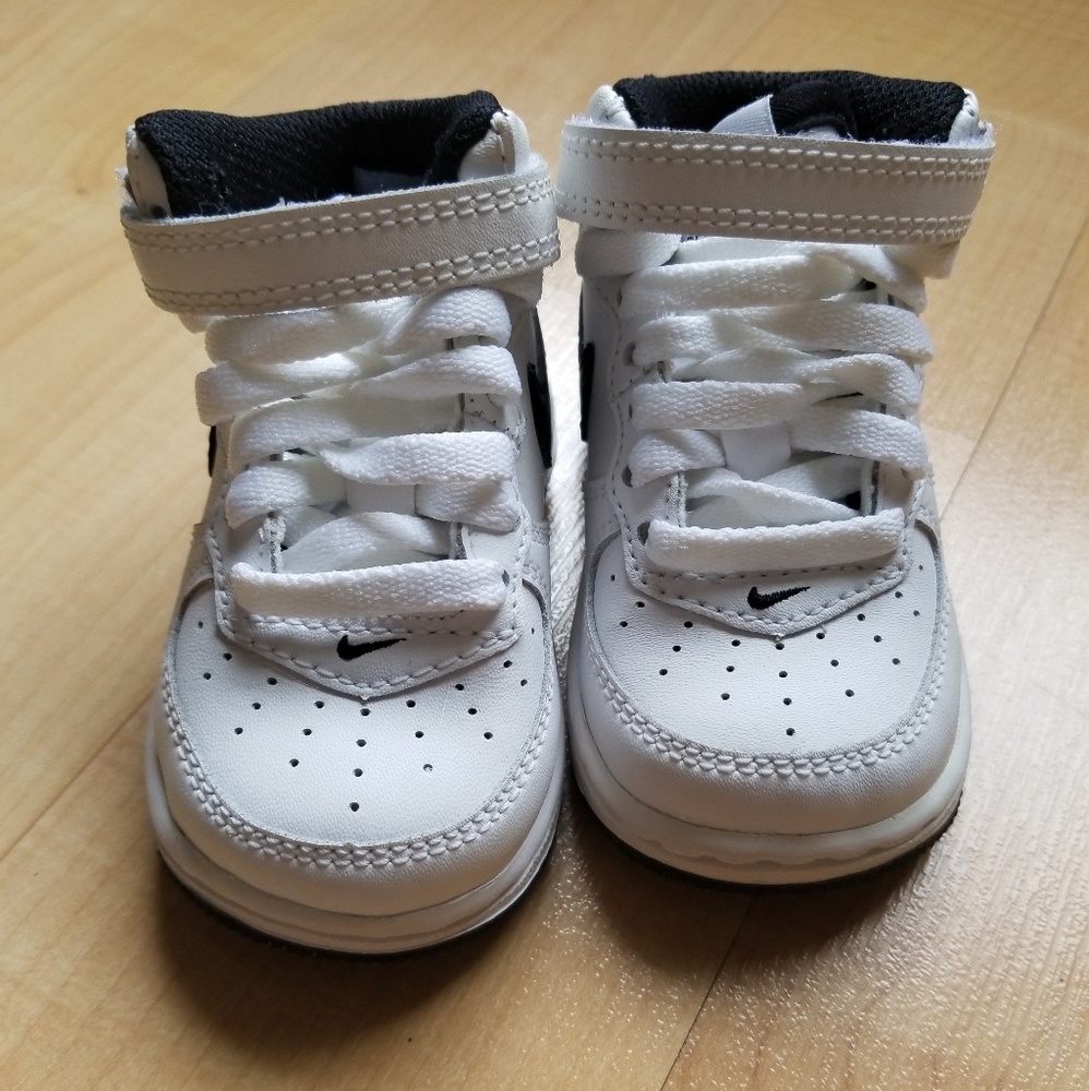 White & Black Nike baby shoes